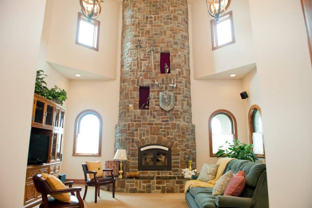 Massive Stone fireplace truly befitting a chateau!