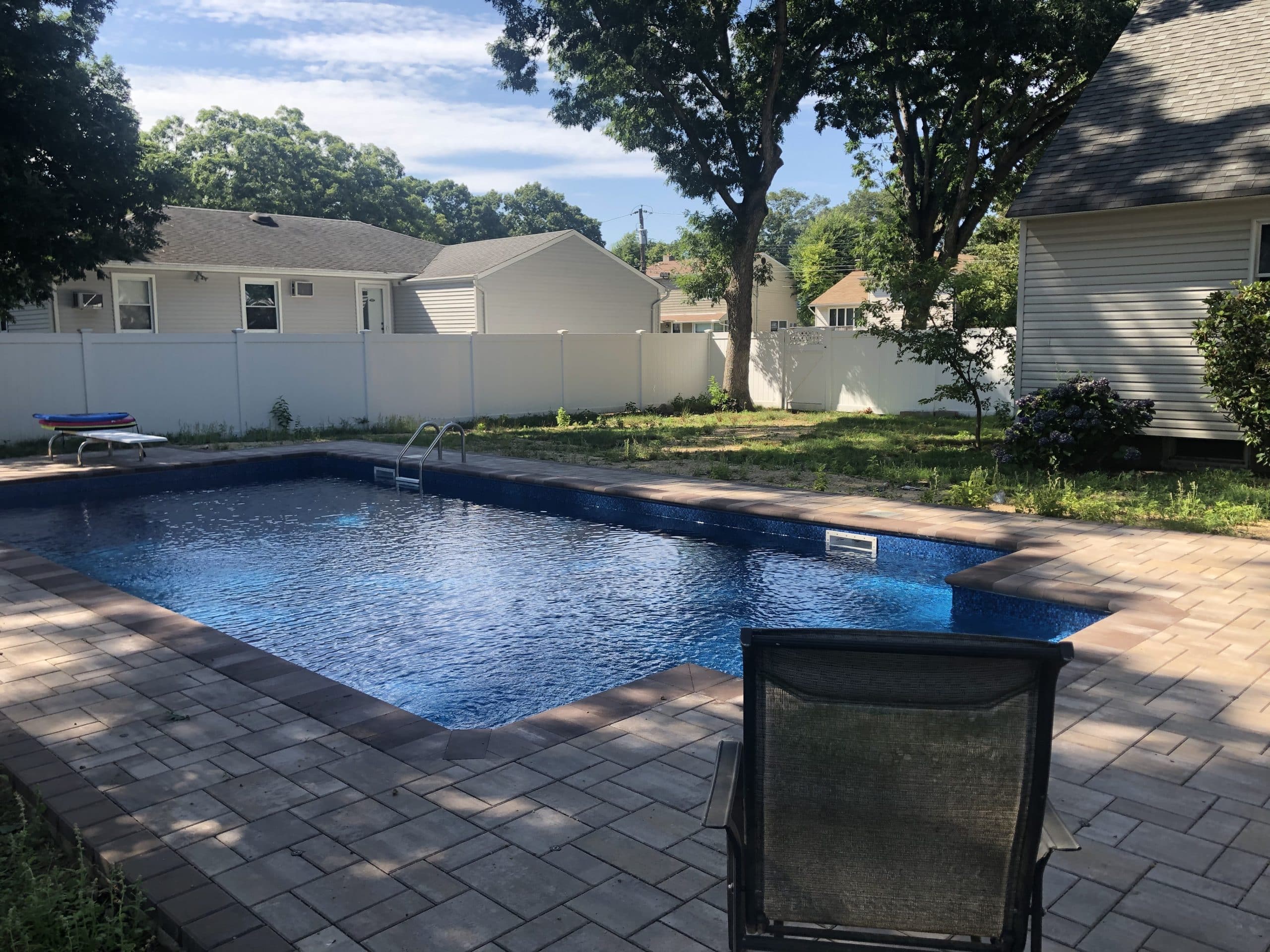 Inground swimming pool at this Massapequa Park Home.