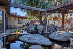 cascading ponds at this Unique yucca valley home