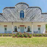 Outside view of historic Bayou front home transformed from an abandoned general store.