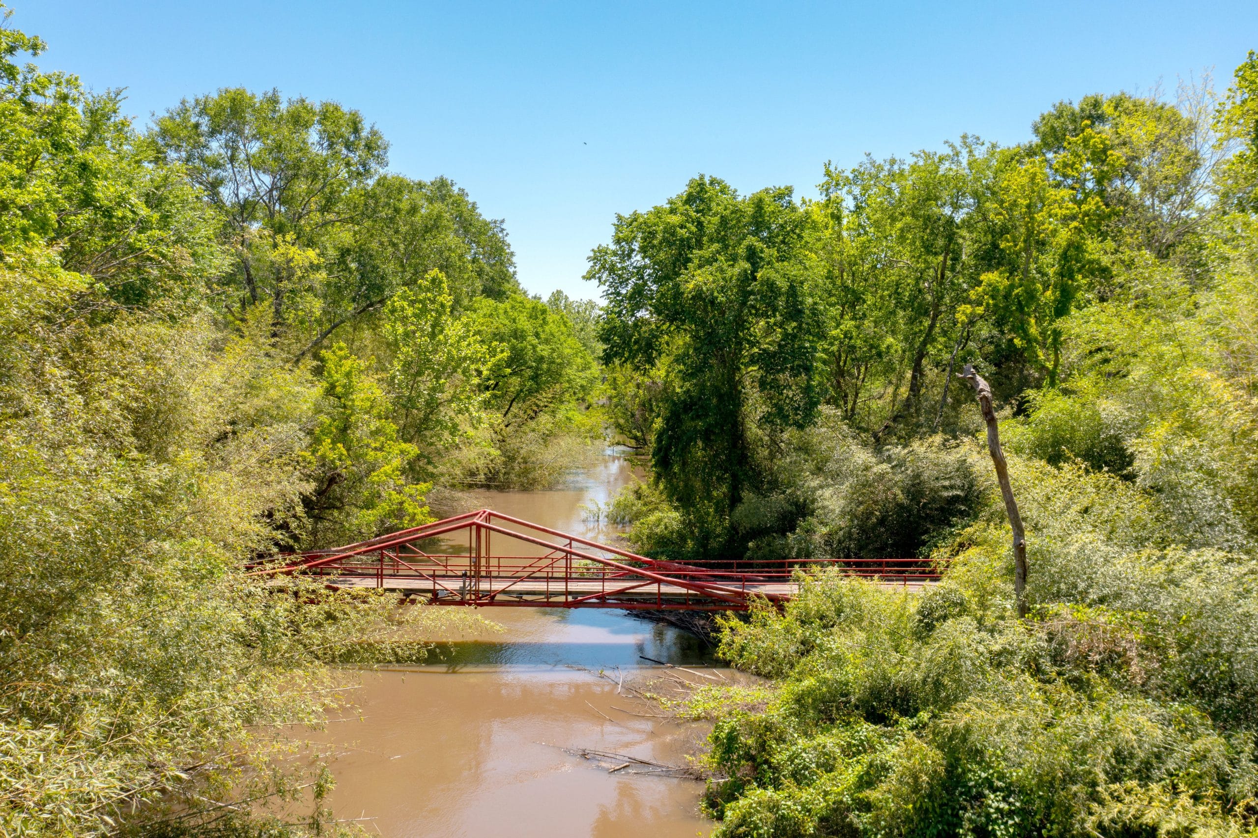 Aerial view of river and bridge to Bayou Magic