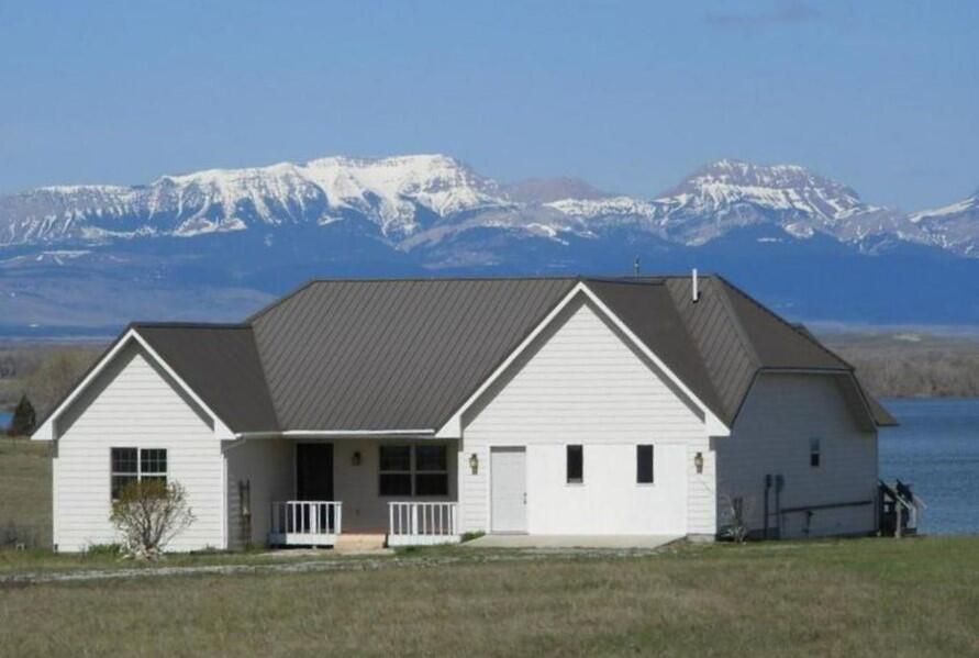 Views of the lake and mountains from this Waterfront Eureka Reservoir Home