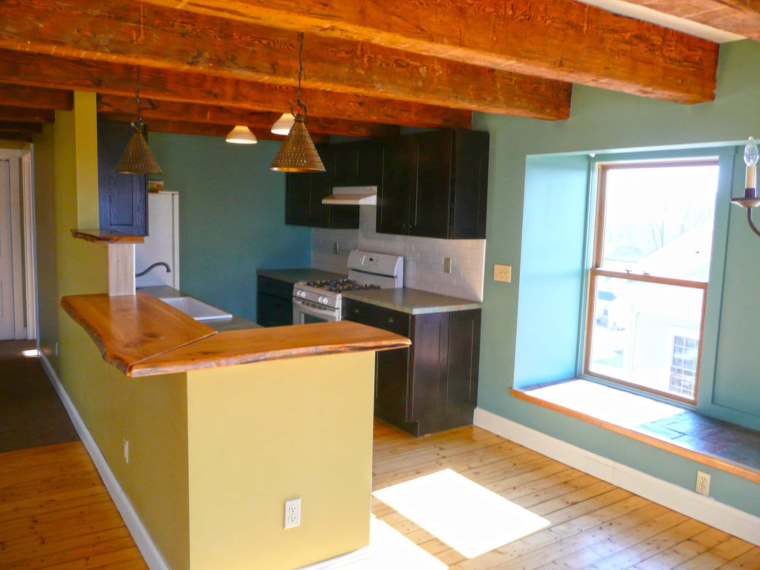 Updated and sunny apartment kitchen.i