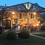 Evening view of the front of the Contemporary Multi-Generational House