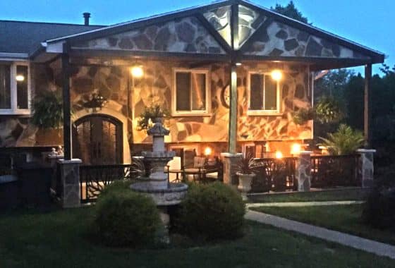 Evening view of the front of the Contemporary Multi-Generational House