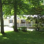 Front view of the prepper home with bunker