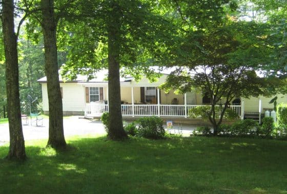 Front view of the prepper home with bunker