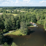 Aerial view of the pond at the prepper's waterfront paradise.