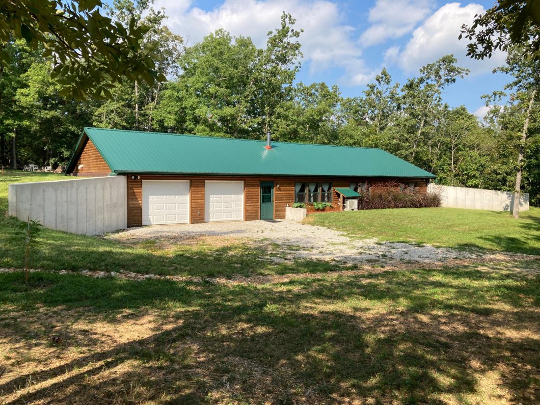 Exterior view of the earthberm prepper house.